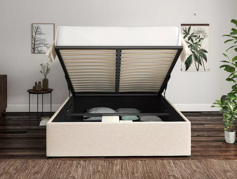 Ottoman bed open showing hidden storage space