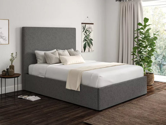 Comfortable upholstered ottoman bed with mattress