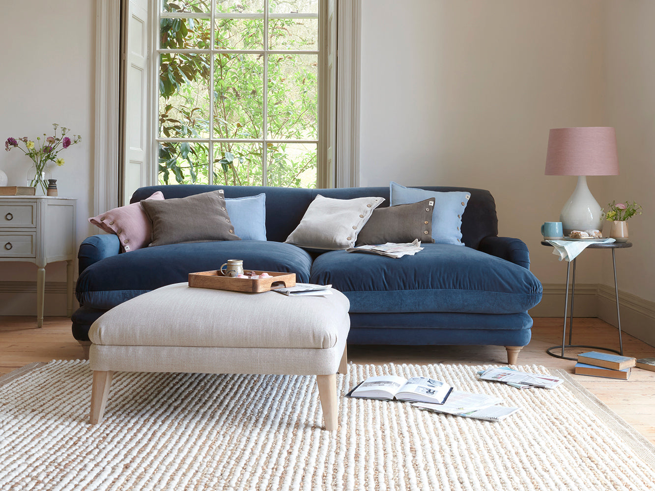 Unveiling the Scuffler Footstool with Wooden Legs in Range of Exciting Colors