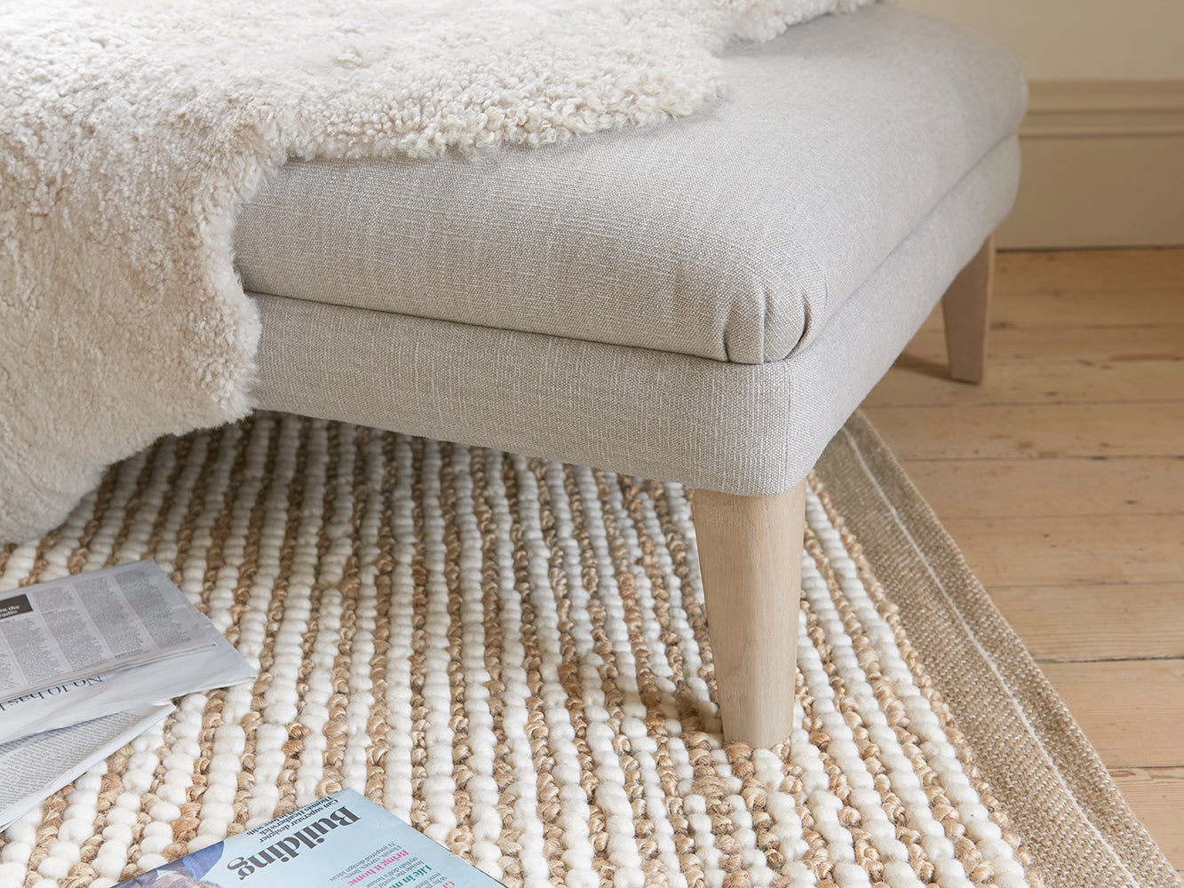 Unveiling the Scuffler Footstool with Wooden Legs in Range of Exciting Colors