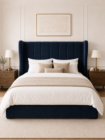 Kensington Vertical-Channel Wingback Ottoman Storage Bed – Navy Blue shown from the side in a styled bedroom