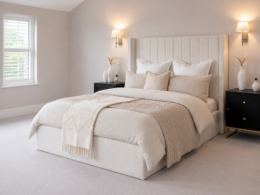 Grosvenor Fluted Wingback Ottoman Storage Bed — white ottoman bed in off-white bouclé with a fluted wingback headboard (view 1)