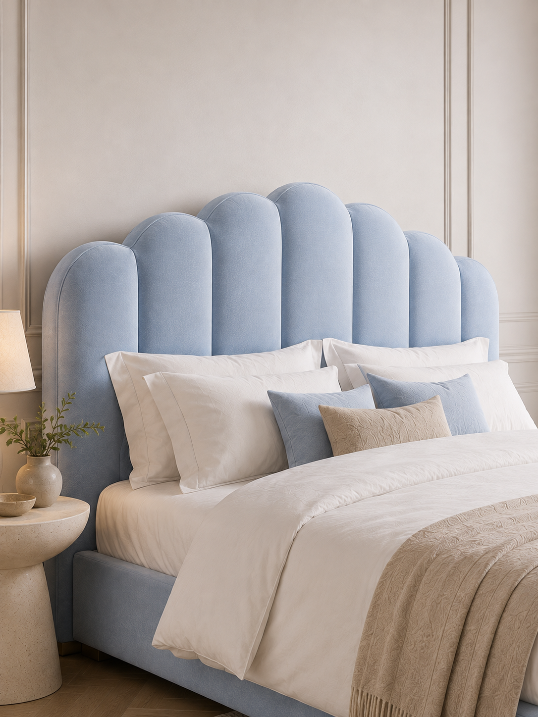 Close detail of the scalloped shell headboard on the Luna Scalloped Shell Velvet Ottoman Storage Bed – Powder Blue